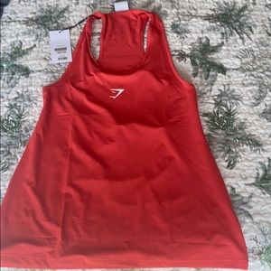 Gymshark M tank in orange